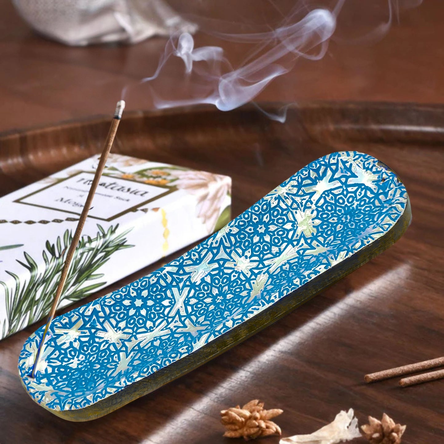 incense_sticks with blue burner
