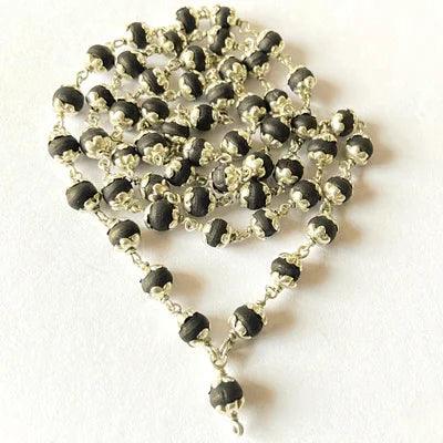 Discover the Spiritual Significance of Black Tulsi Mala with Silver Capping